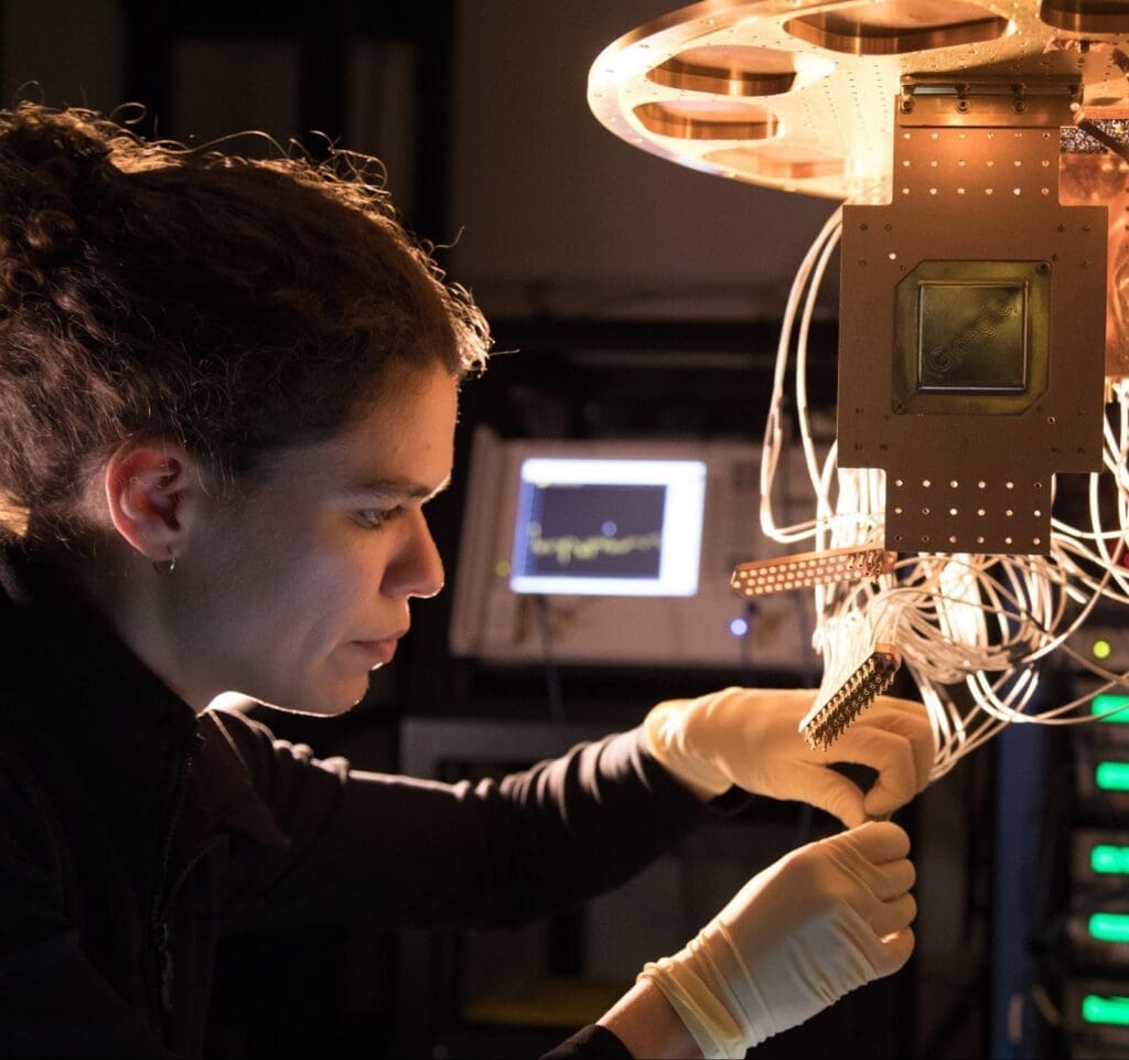 A Bristlecone chip being installed by Research Scientist Marissa Giustina at the Quantum AI Lab in Santa Barbara